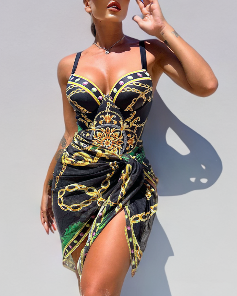 Anna® | Einteiler Badeanzug mit Push-up und dekorativen Kettendetails sowie Strandrock